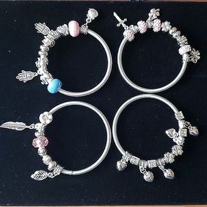 4 Bracelets with Mixed Charms